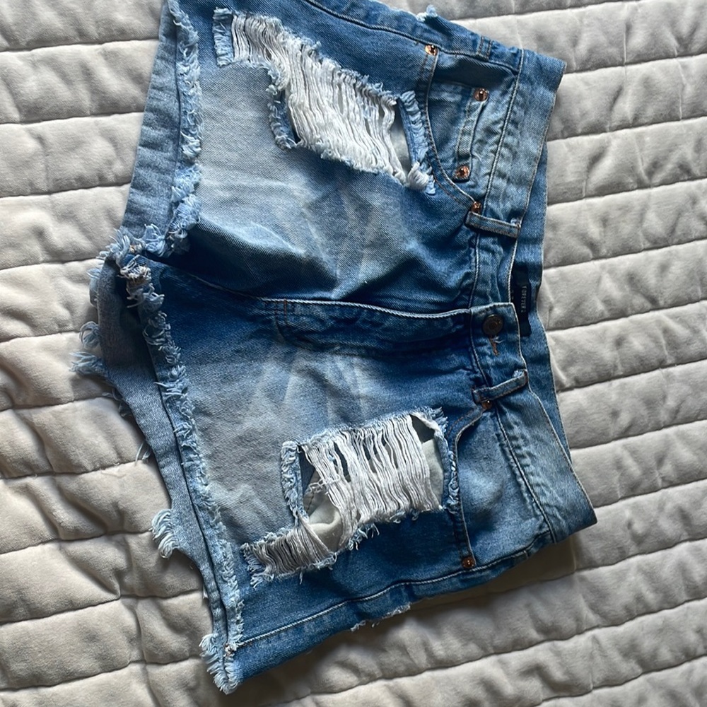 Ripped jean shorts